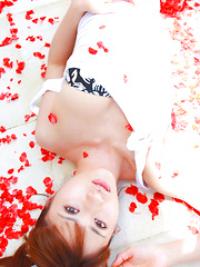 Saki Yamaguchi Asian spoils leering body in water with petals - Japarn porn pics at JapHole.com