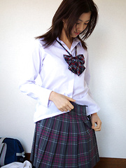 Azusa Togashi Asian undresses uniform to show behind in panty - Japarn porn pics at JapHole.com