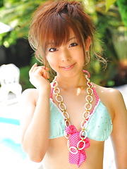 Sexy Japanese honeys pose in tiny bikinis - Japarn porn pics at JapHole.com