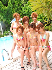 Sexy Japanese honeys pose in tiny bikinis - Japarn porn pics at JapHole.com