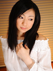 Emiko Koike teases in white lingerie on bed - Japarn porn pics at JapHole.com