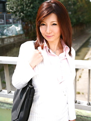 Sweet Sayuri Mikami poses in business suit - Japarn porn pics at JapHole.com