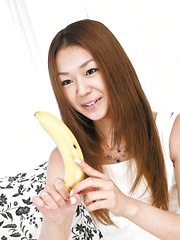 Sakura Hirota Asian licks banana, black dildo and hard phallus - Japarn porn pics at JapHole.com