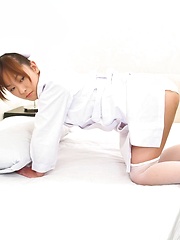 Japanese nurse Miina Minamoto alone and toying in a room - Japarn porn pics at JapHole.com