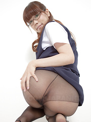 Hot darling Amu Umino shows her stockings - Japarn porn pics at JapHole.com
