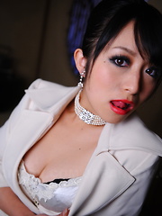 Elegant Asian chick Nana Kunimi shows off - Japarn porn pics at JapHole.com