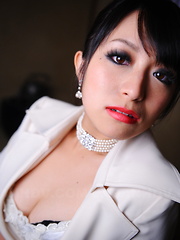 Elegant Asian chick Nana Kunimi shows off - Japarn porn pics at JapHole.com