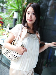 Asian gal Yayoi Yanagida shows off outdoors - Japarn porn pics at JapHole.com