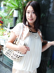 Asian gal Yayoi Yanagida shows off outdoors - Japarn porn pics at JapHole.com