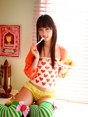 Rina Akiyama Asian in long colorful socks enjoys some sweets - Japarn porn pics at JapHole.com