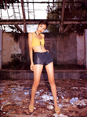 Aki Hoshino Asian tries to hide cans and shows appetizing behind - Japarn porn pics at JapHole.com