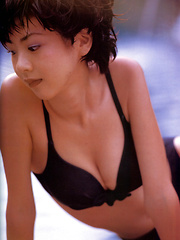 Aki Hoshino Asian tries to hide cans and shows appetizing behind - Japarn porn pics at JapHole.com