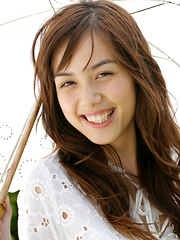 Rola Chen Asian takes clothes off under umbrella in the park - Japarn porn pics at JapHole.com