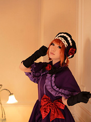 Saku Asian looks just like a doll in her mauve old times dress - Japarn porn pics at JapHole.com