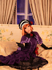 Saku Asian looks just like a doll in her mauve old times dress - Japarn porn pics at JapHole.com