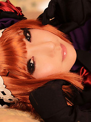 Saku Asian looks just like a doll in her mauve old times dress - Japarn porn pics at JapHole.com