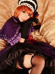 Saku Asian looks just like a doll in her mauve old times dress - Japarn porn pics at JapHole.com