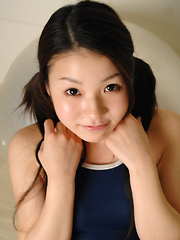 Misaki Asian babe in swimming suit jumps with slit on big ball - Japarn porn pics at JapHole.com