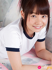 Mana Asian doll in sports outfit is naughty and shows hot behind